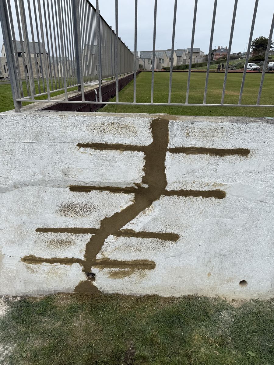 Crack stitching repair to a concrete retaining wall, Dorset