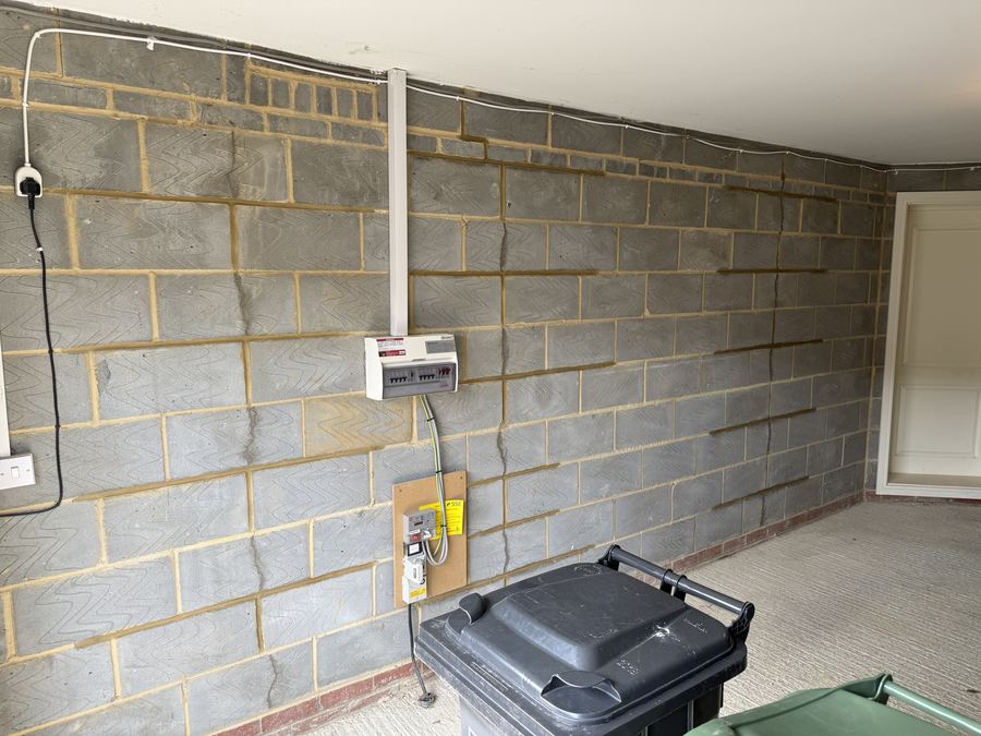 Crack stitching repair to a Thermalite block garage wall