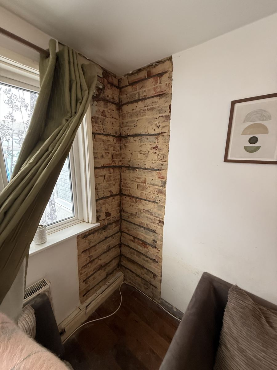 Helical bar crack stitching repair to an internal corner crack, tenanted property, Southampton
